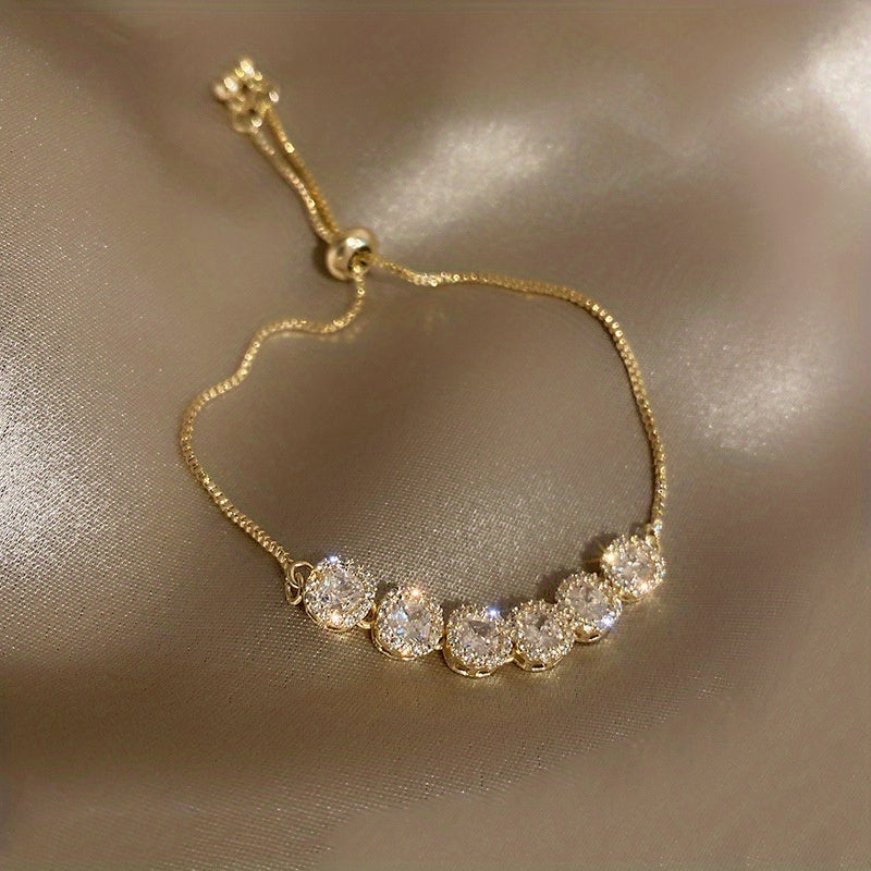 A Square Bracelet Made of Real Gold-Plated Zirconia.