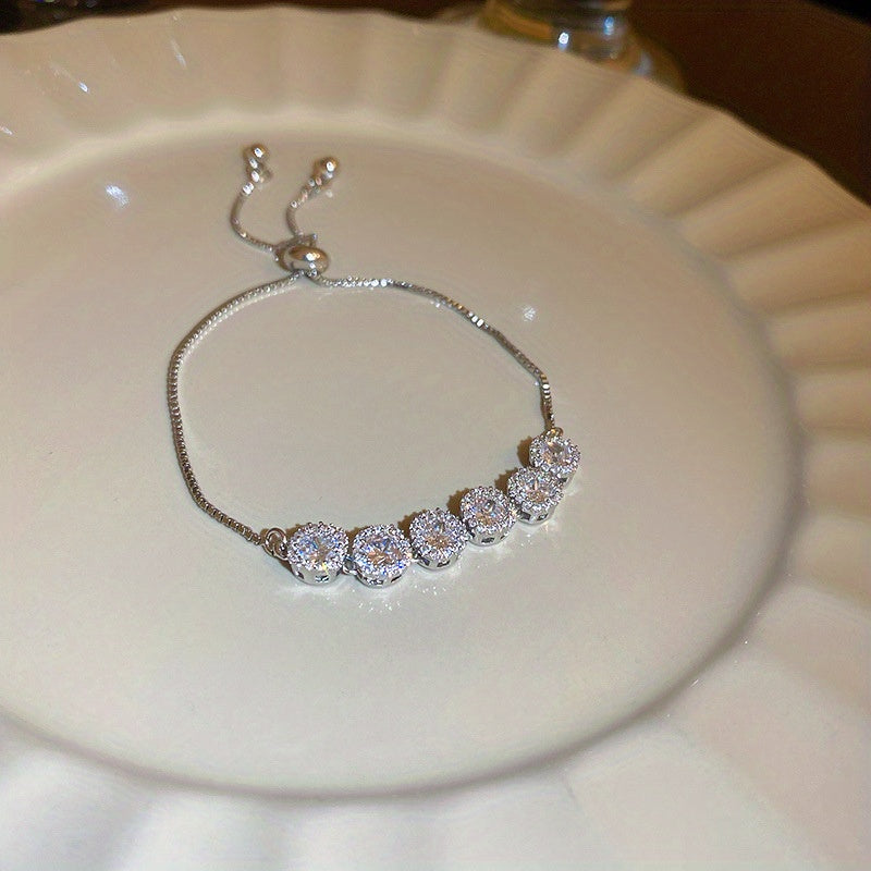 A Square Bracelet Made of Real Gold-Plated Zirconia.